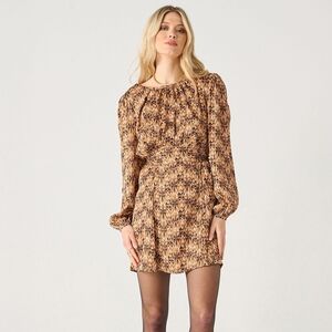 Black Tape_ Brown and Tan Patterned Garment